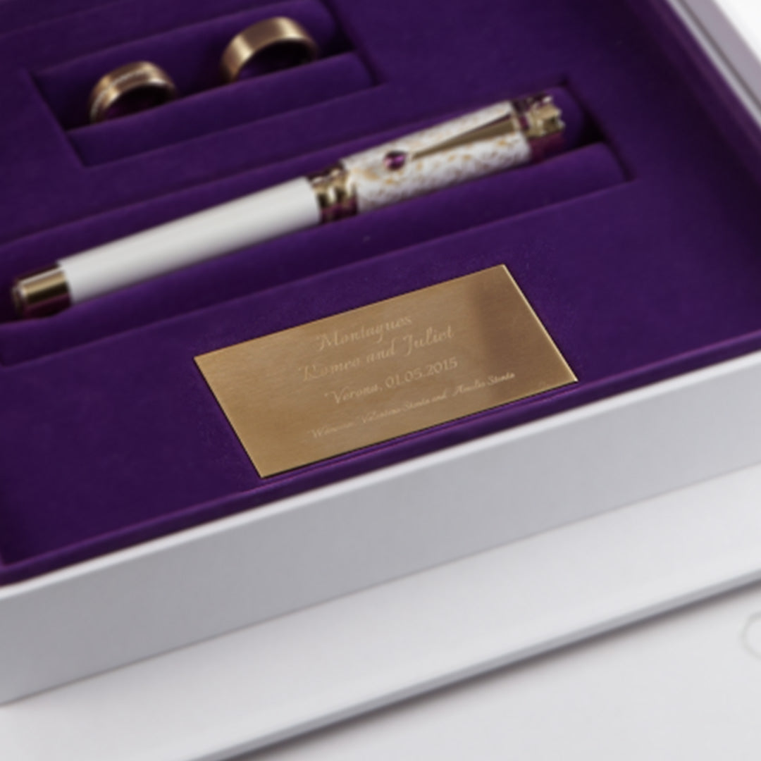Wedding Pen Legacy Edition in the open Memory Box with rings and engraved plaque.