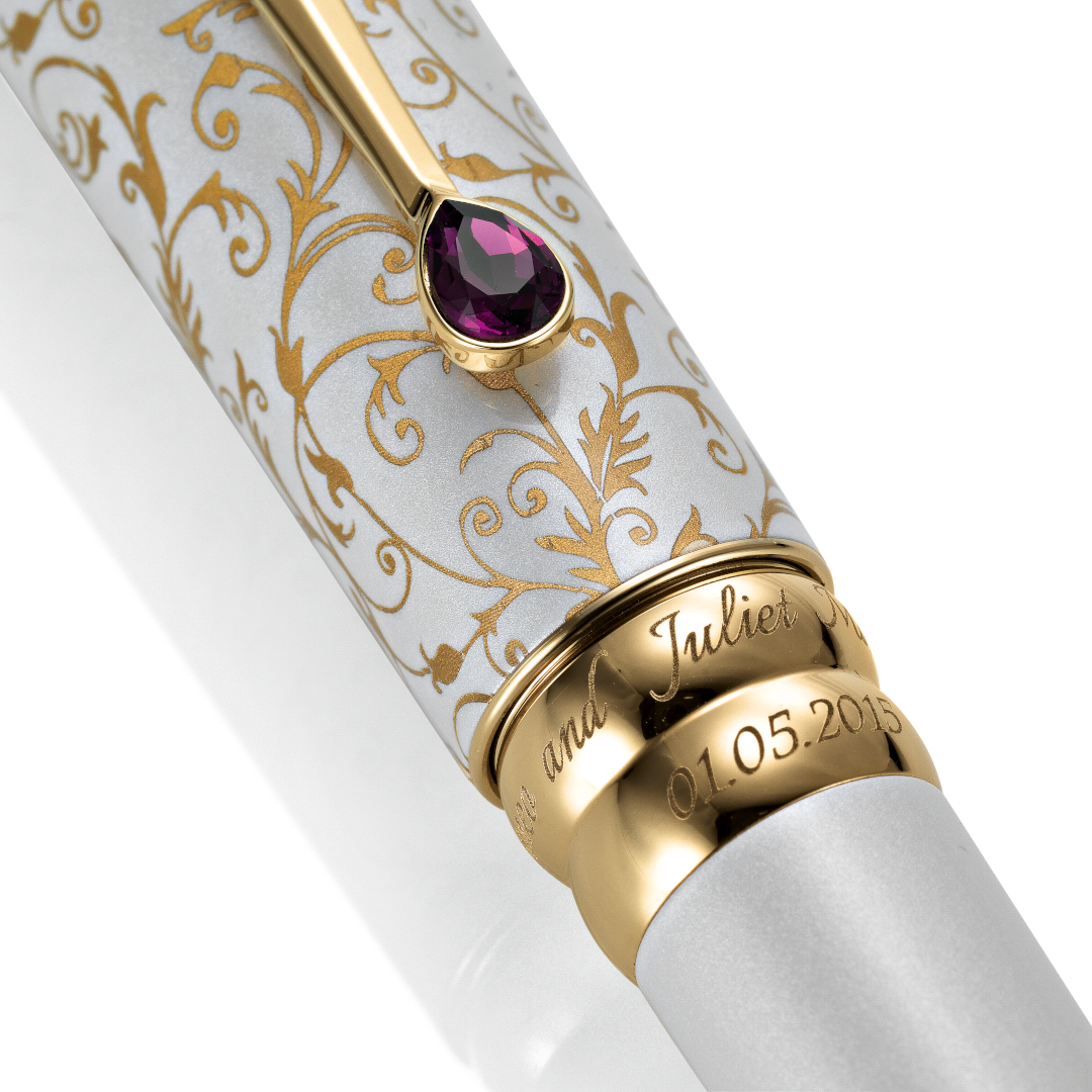 Wedding Pen Legacy Edition with rings engraved with names and wedding date.